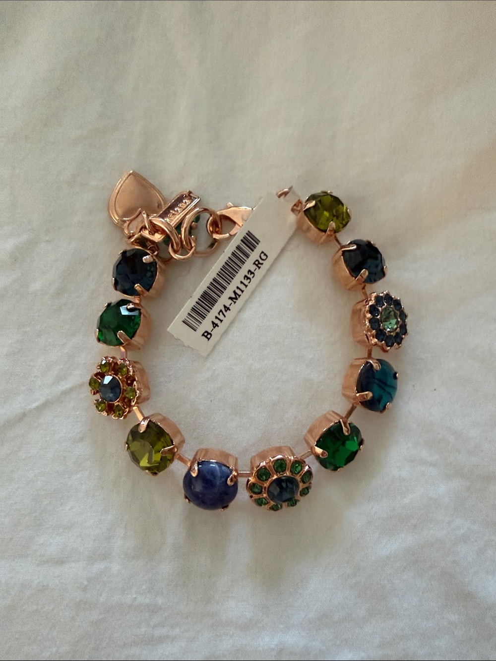 NWT Mariana Bracelet with mixed blues and greens Crystal Stones set in Rose meta